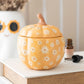 Groovy Floral Pumpkin – Kürbis-Stövchen aus Keramik mit Blumenmuster und Deckel